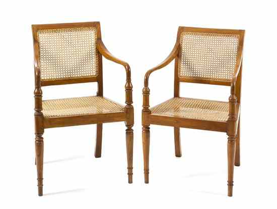 Appraisal: A Pair of George III Style Mahogany Open Armchairs having