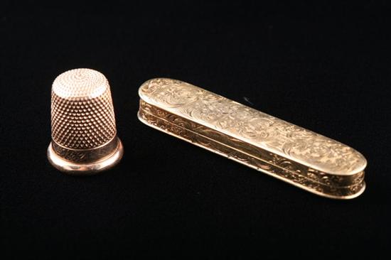 Appraisal: TWO VICTORIAN K YELLOW GOLD SEWING ACCESSORIES Thimble with engraved