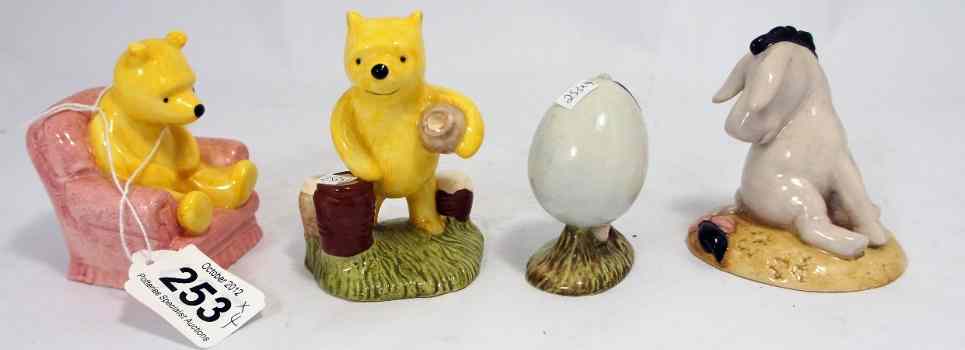 Appraisal: Royal Doulton Winnie the Pooh Figures comprising Eeyores Tail WP