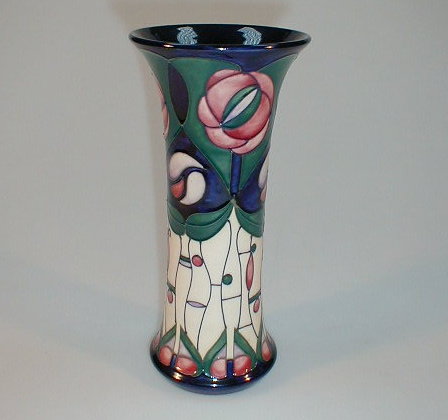 Appraisal: A Moorcroft pottery taper vase with flared rim modern