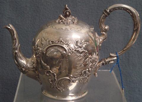 Appraisal: Silver Teapot Signed G E Keyser floral repousse design high