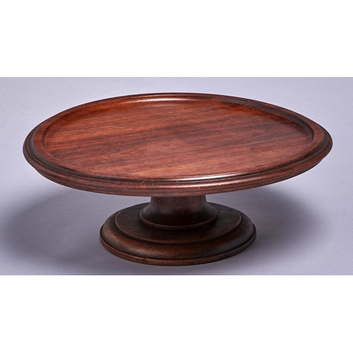 Appraisal: A turned mahogany lazy susan dished top cm diam More