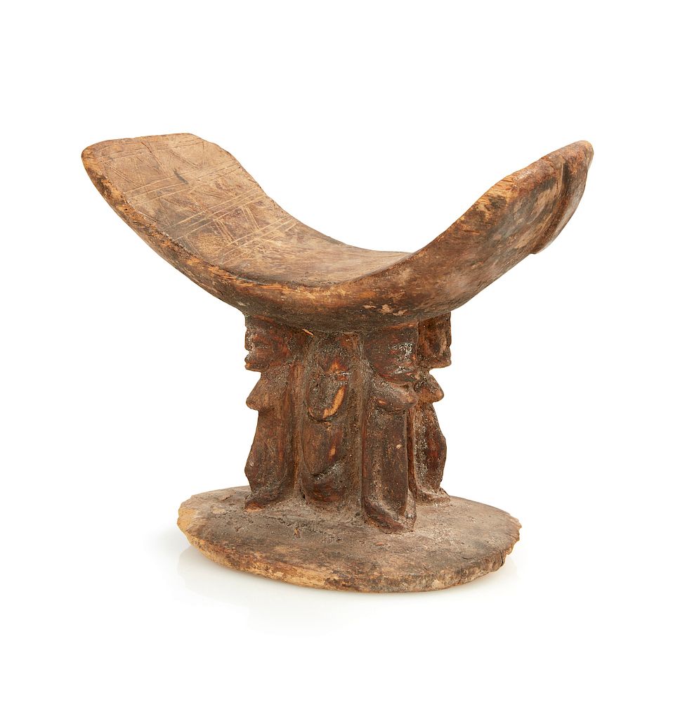 Appraisal: Dogon Headrest with Figures Dogon carved wood headrest with four