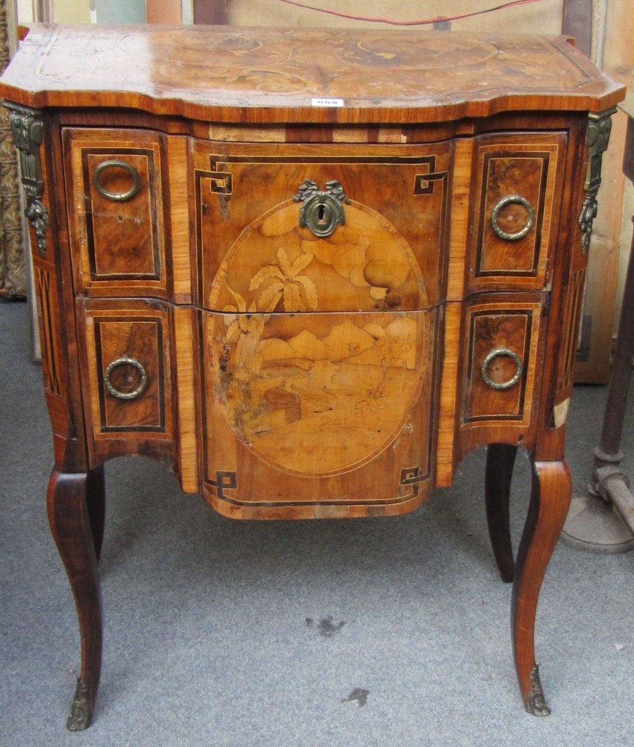 Appraisal: A Louis XV style marquetry walnut sycamore fruitwood and tulipwood