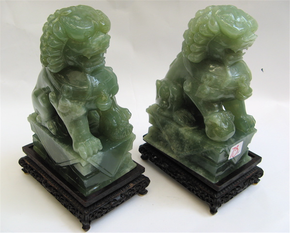 Appraisal: PAIR SERPENTINE FOO DOGS a male and a female in