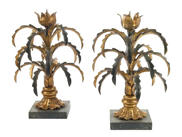 Appraisal: A pair of Italian Baroque style giltwood and tole candle