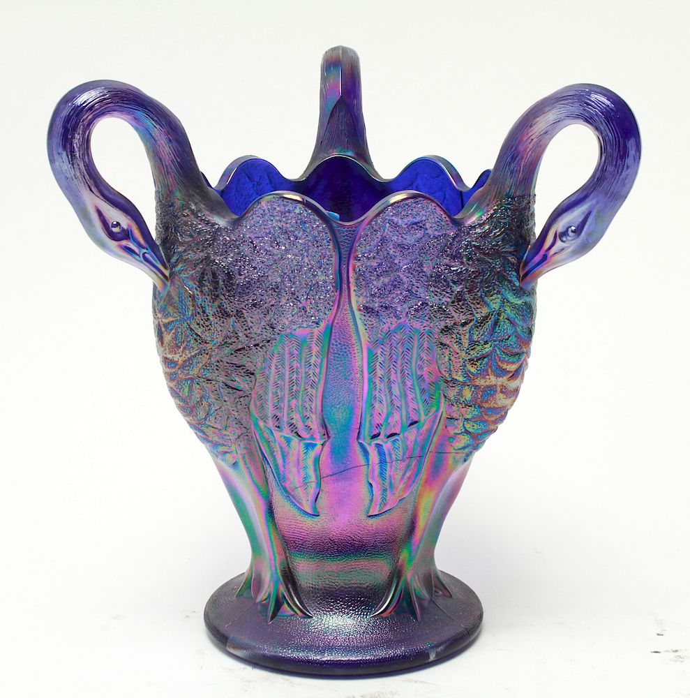 Appraisal: Imperial Carnival Glass Iridescent Swan Vase Imperial Glass Co carnival