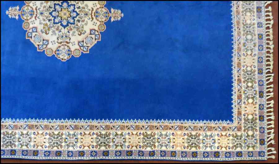 Appraisal: RABAT CARPET Ivory medallion and border with a blue field