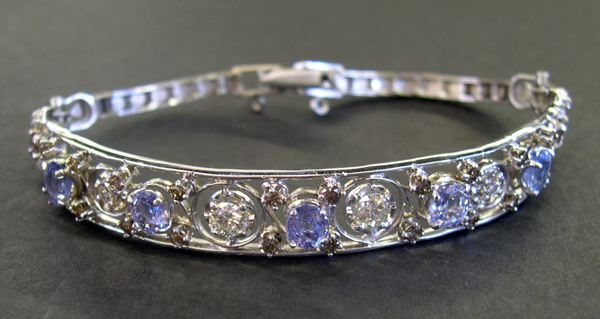 Appraisal: Fourteen Karat White Gold Ceylon Sapphire and Diamond Bracelet containing