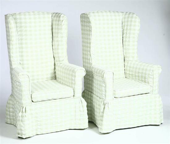 Appraisal: PAIR OF WINGBACK CHAIRS Of typical form with salmon and