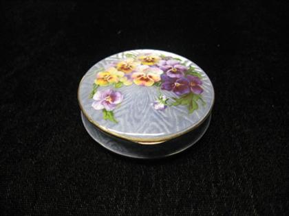 Appraisal: One gold compact with mirror and blush pad inside lavender