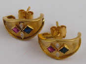 Appraisal: A pair of carat gold ruby sapphire and diamond earrings