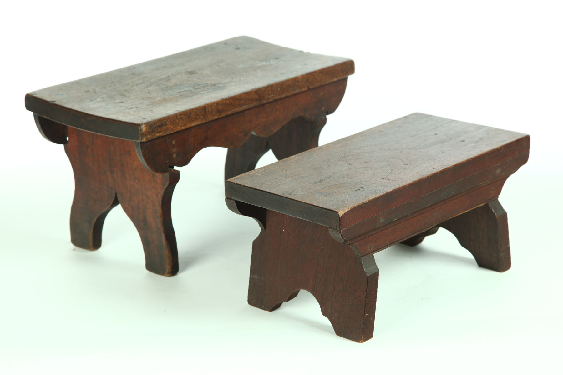 Appraisal: TWO FOOTSTOOLS American th century walnut Both with rectangular tops