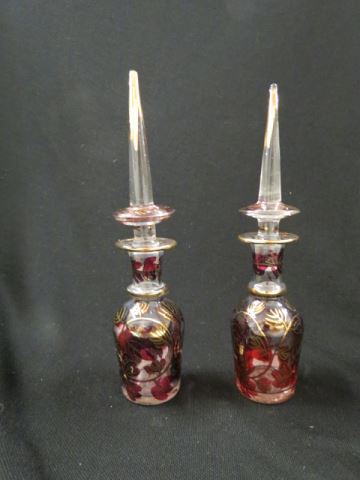 Appraisal: Pair of Enameled Glass Perfume Bottles red gold vine