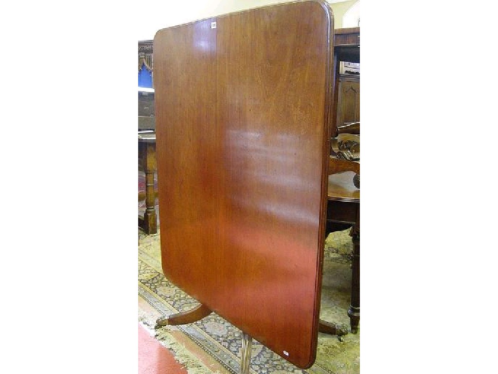 Appraisal: A Georgian mahogany tilt top breakfast table of rectangular form