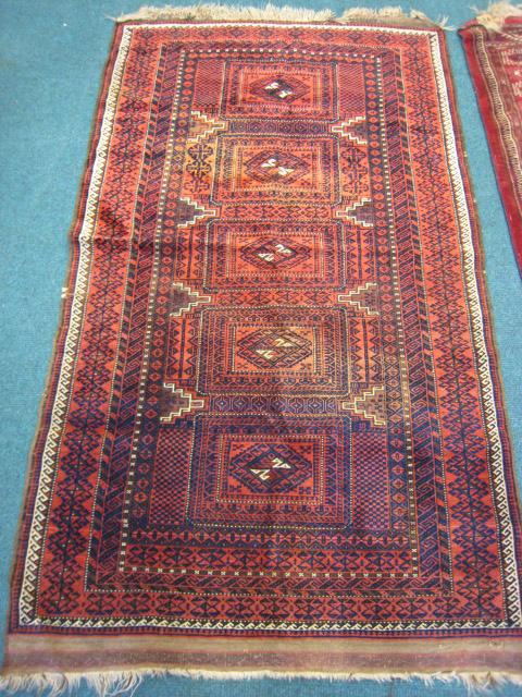 Appraisal: A Persian multi bordered silk Rug of geometric design on