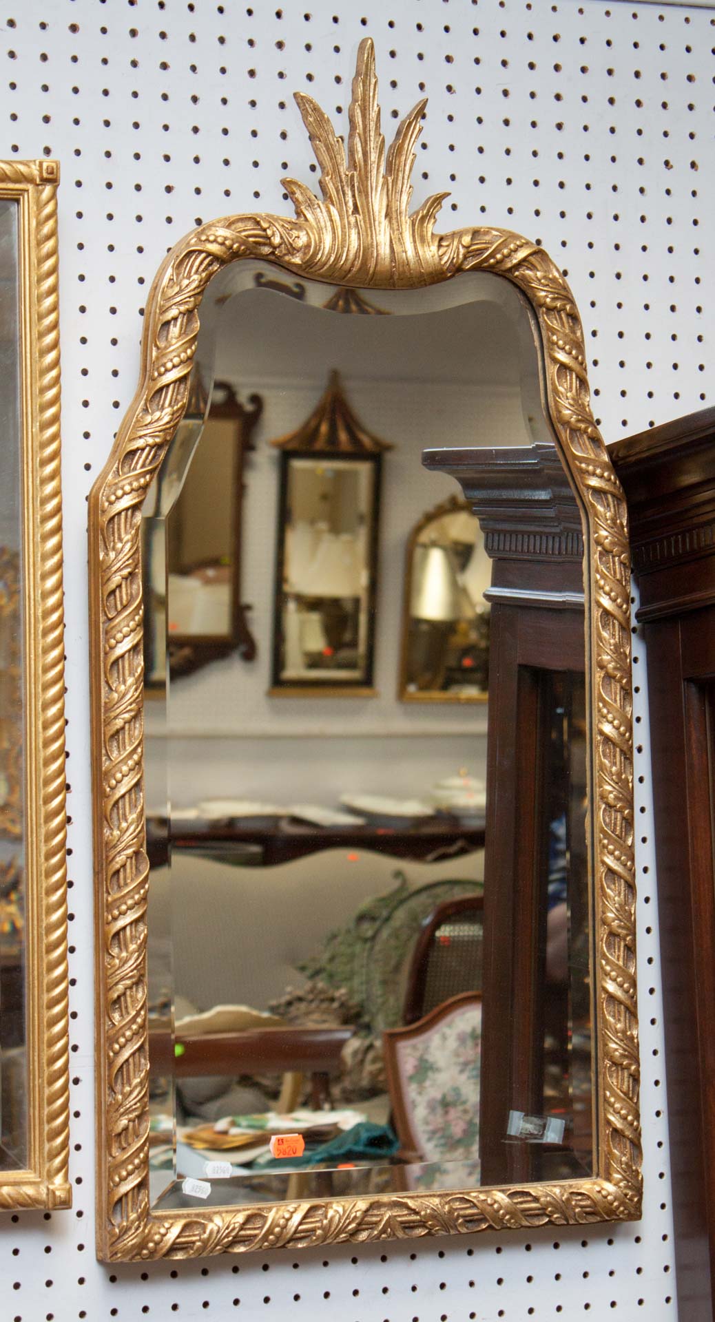 Appraisal: Giltwood wall mirror with plume finial