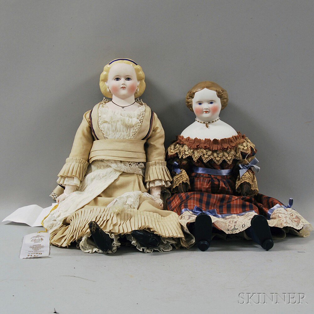 Appraisal: Two Parian Shoulder Head Dolls Germany one with white skin