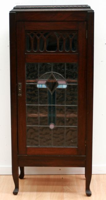 Appraisal: An Arts and Craft art glass glazed display cabinet cms