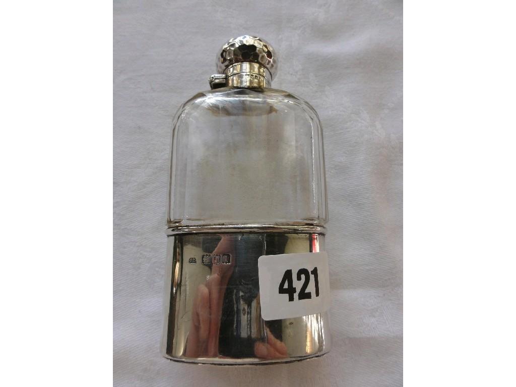 Appraisal: A glass hip flask with silver mount and lid the