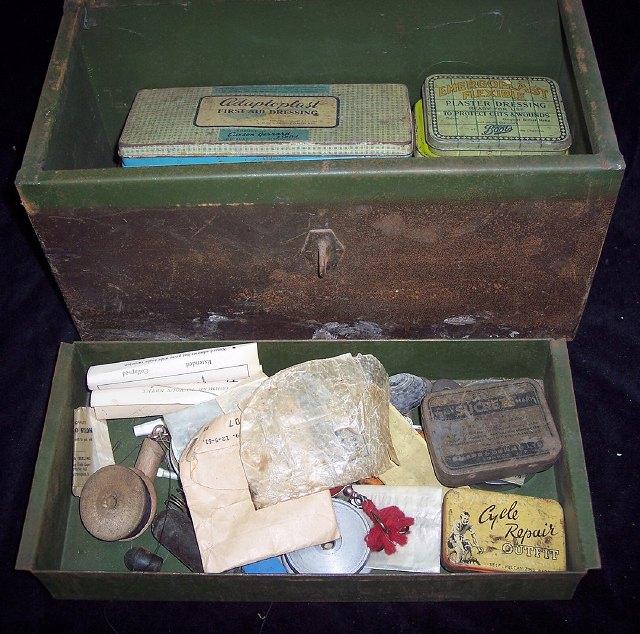 Appraisal: A tin box containing fishing tackle including Hardy's lures etc