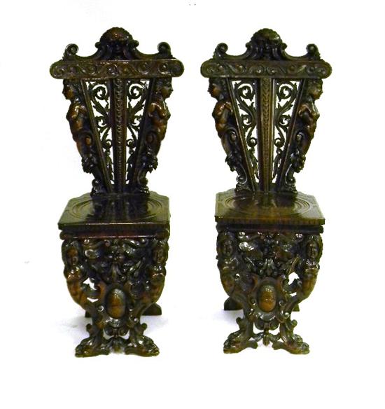 Appraisal: Pair of Renaissance Revival side chairs ornately carved with caryatids