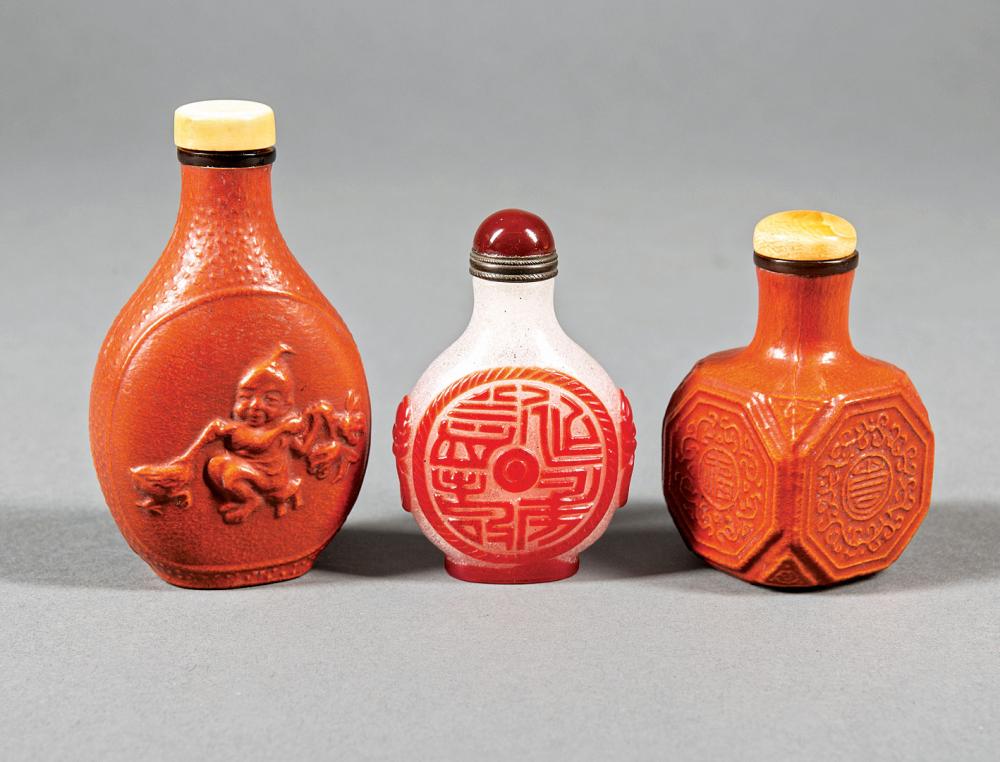 Appraisal: Three Chinese Snuff Bottles incl red overlay snowflake glass base