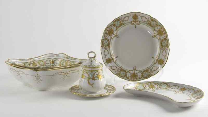 Appraisal: pc KPM Porcelain Dinner Serviceeach piece with heavy Rococo style