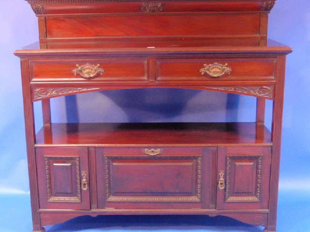 Appraisal: A late Victorian mahogany buffet with dentil moulded and acanthus