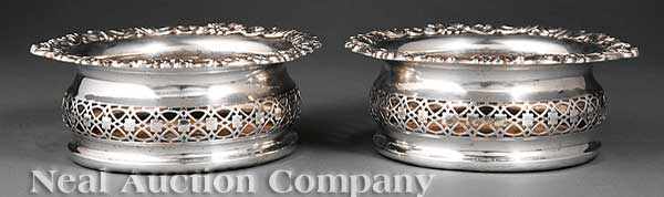 Appraisal: A Good Pair of Antique English Silverplate Decanter Coasters mid-