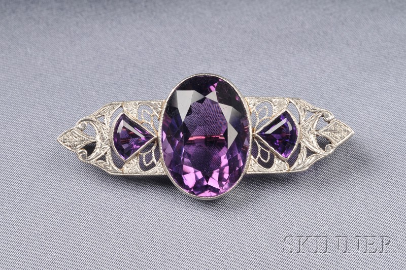 Appraisal: Art Deco Amethyst and Diamond Brooch bezel-set with an oval-cut