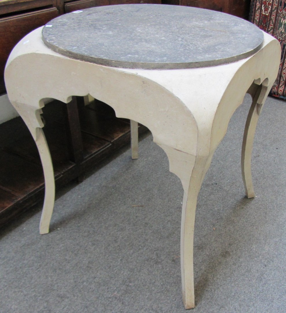 Appraisal: A continental painted mahogany centre table the circular faux marble