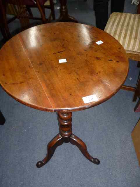 Appraisal: A TH CENTURY WINE TABLE the circular top over turned