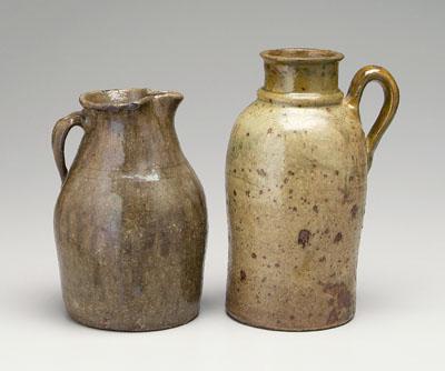 Appraisal: Two stoneware pitchers both alkaline glaze one with medium olive