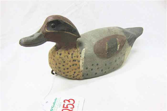 Appraisal: CARVED WOOD DUCK DECOY grey to brown color with tufted