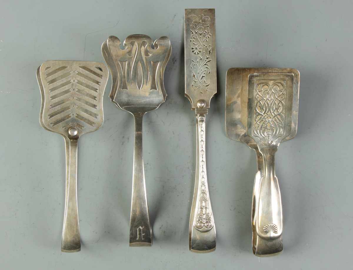 Appraisal: Group of Sterling Tongs Group of Sterling Tongs L to