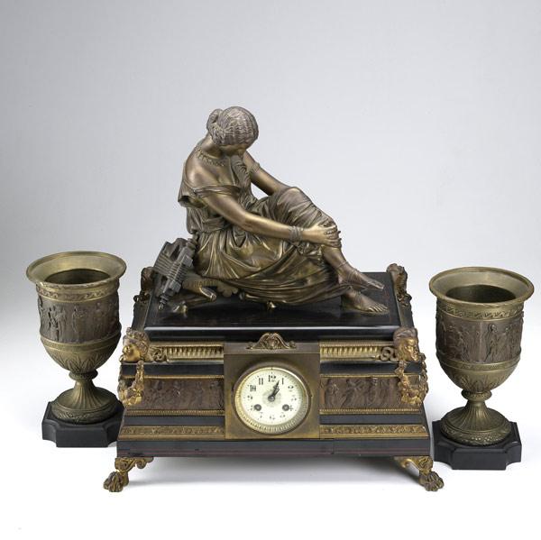 Appraisal: French three piece marble and bronze figural clock set th