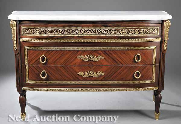 Appraisal: A Louis XVI-Style Bronze-Mounted Commode the shaped white marble top