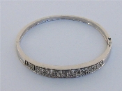 Appraisal: A carat white gold and diamond bangle the central open