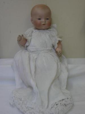 Appraisal: An Armand Marseille bisque head baby doll with blue glass