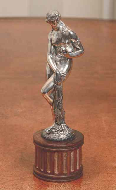 Appraisal: A SILVER PLATED FIGURE of Aphrodite Ourania holding an apple