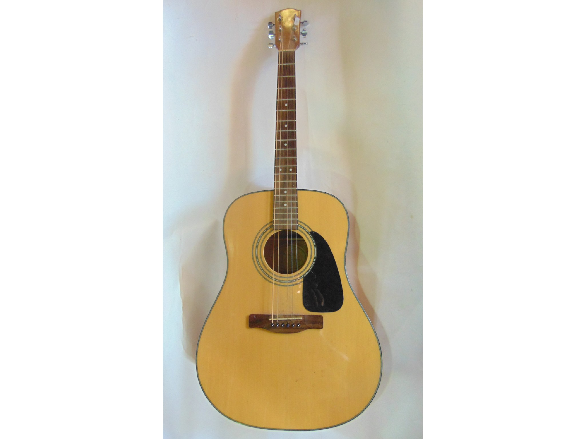 Appraisal: A good quality timber acoustic guitar by Fender labelled to