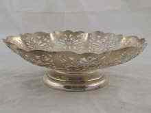 Appraisal: A lobed pierced silver cake dish Sheffield Coronation mark cm