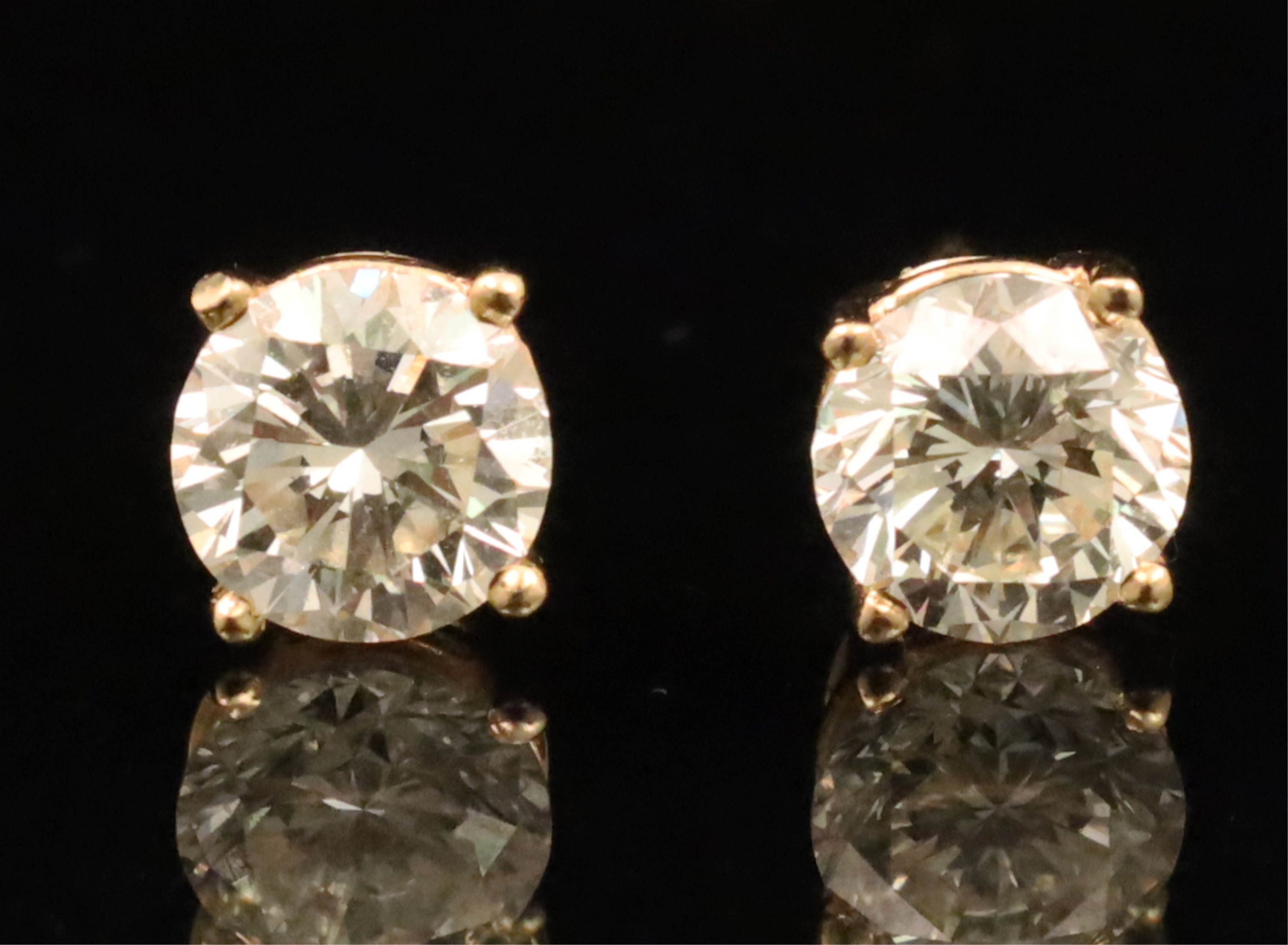 Appraisal: PAIR OF K YELLOW GOLD DIAMOND STUD EARRINGS Pair of