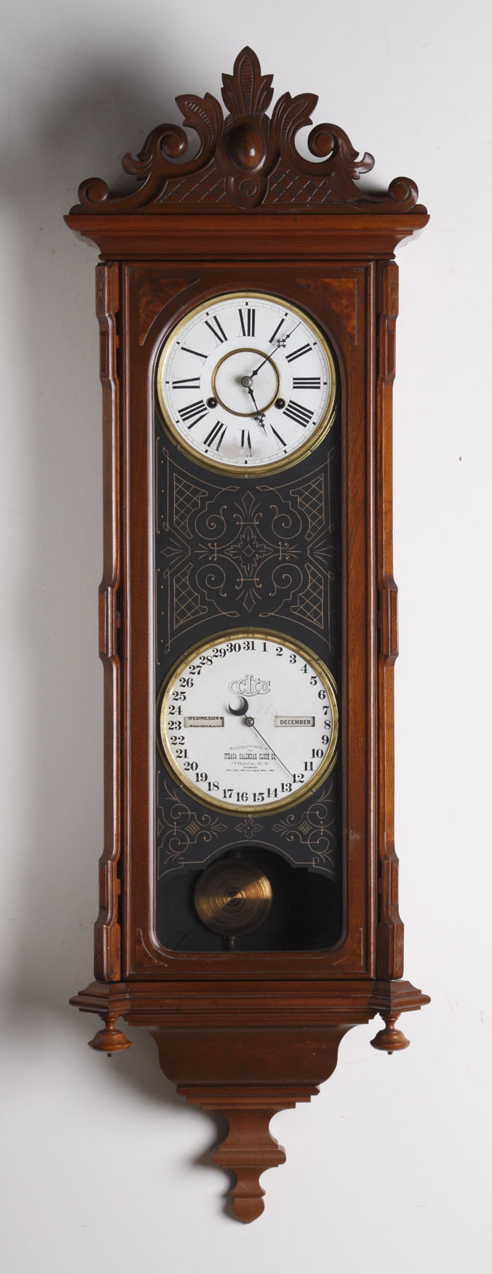 Appraisal: Ithaca Vienna Wall Regulator Carved walnut case in original finish