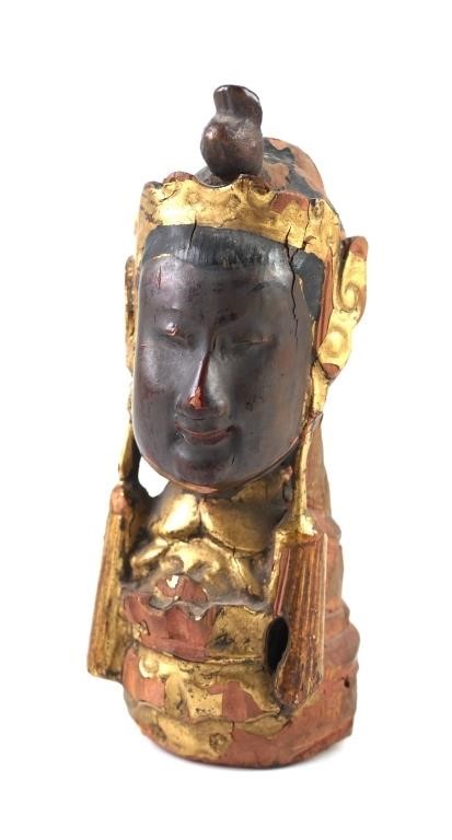 Appraisal: Antique carved wooden bust of Buddha decorated in gilt and