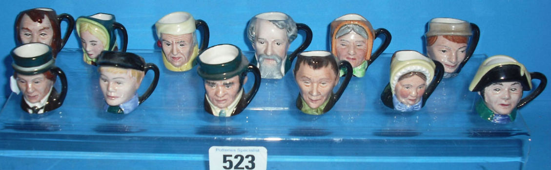 Appraisal: Set Off Royal Doulton tiny Dickens Character jugs comprising Oliver