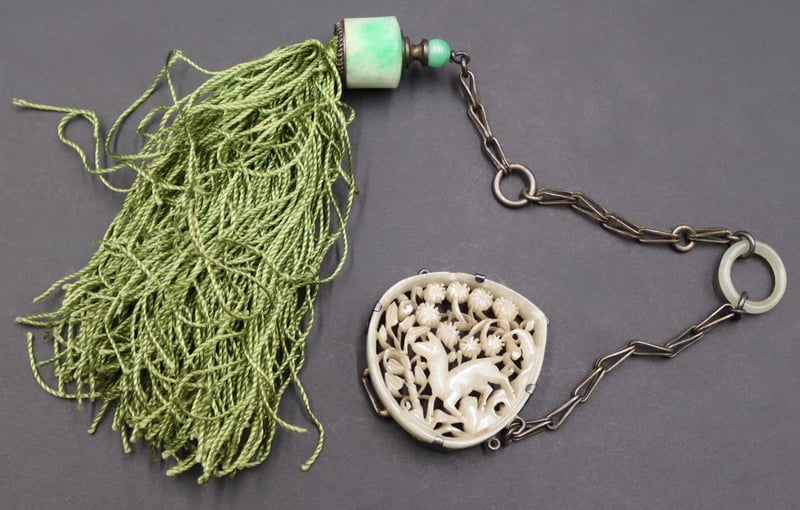 Appraisal: CARVED CHINESE JADE PLAQUE AND BEADS Includes a Chinese silver