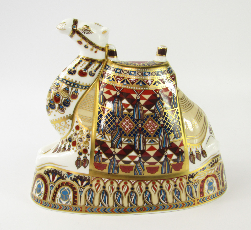 Appraisal: A Royal Crown Derby porcelain Imari camel paperweight gold stopper