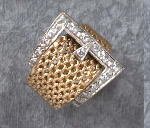 Appraisal: MESH DIAMOND BUCKLE RING k yellow gold mesh ring with